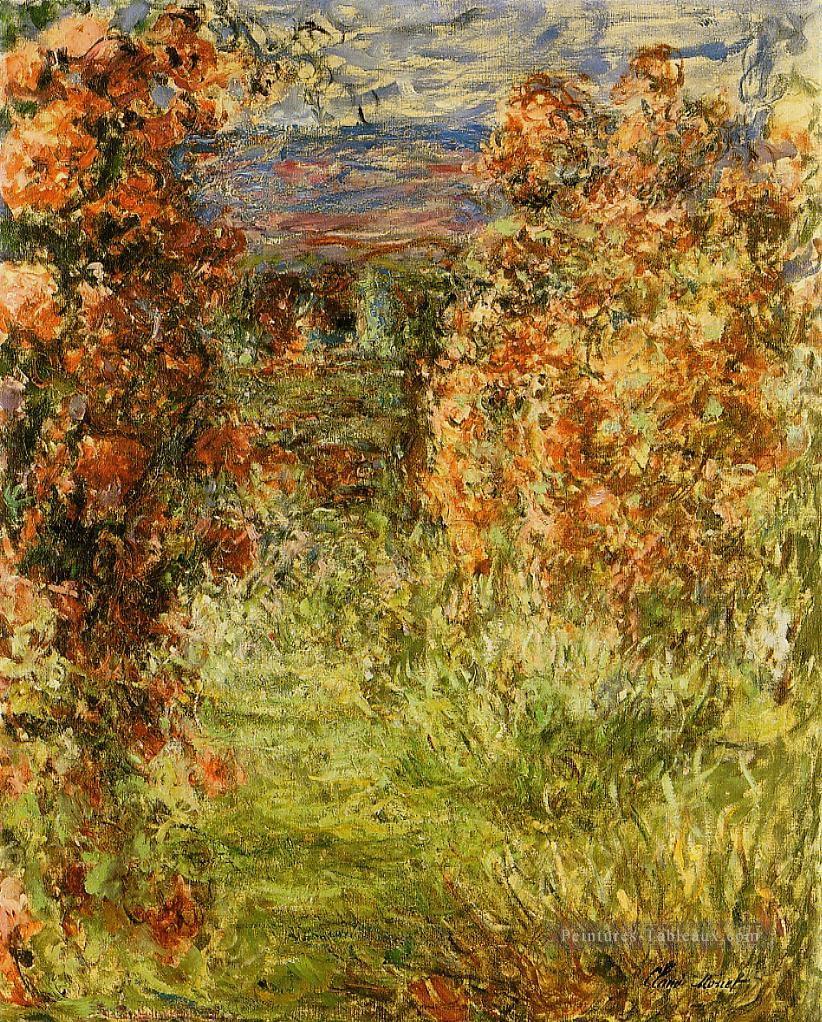 La maison parmi les roses Claude Monet Peintures à l'huile